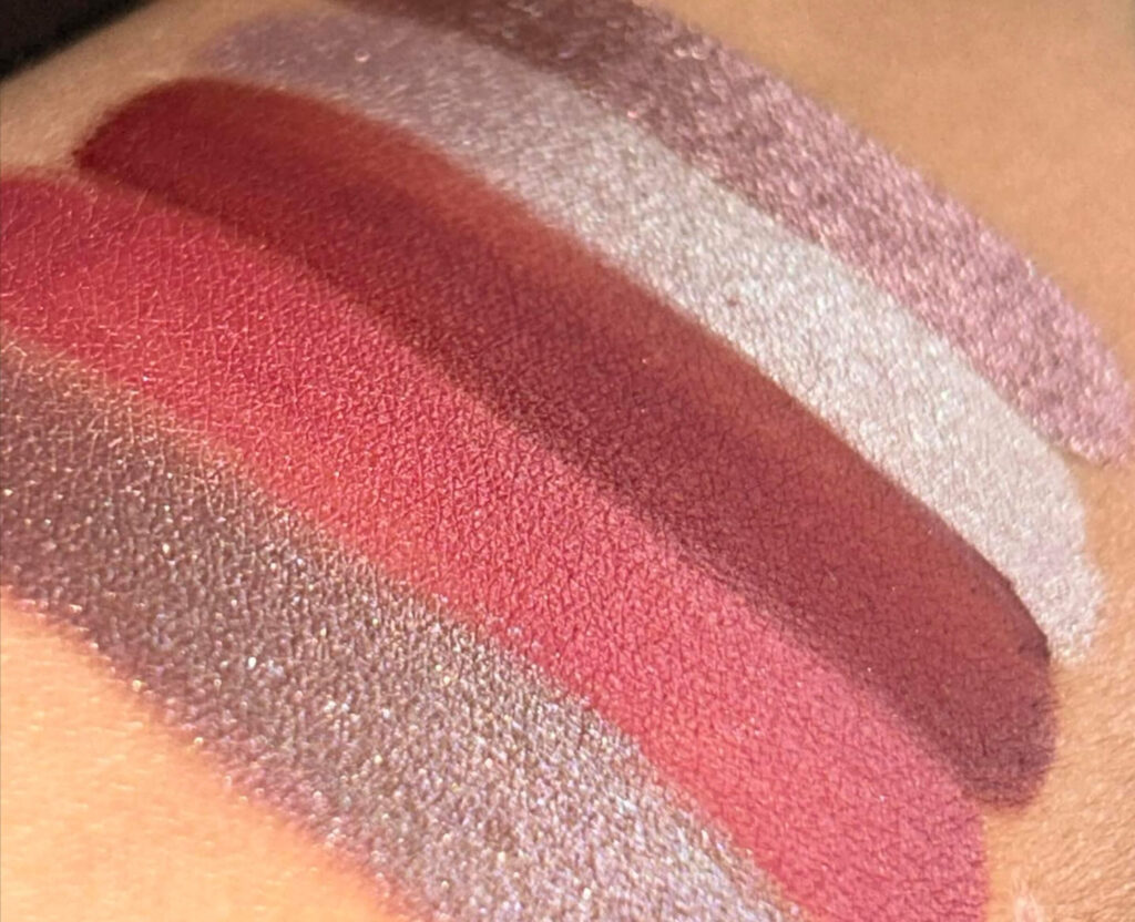 Close-up color swatches of loose powder eyeshadows by Siol Beauty showing detailed pigment shades.